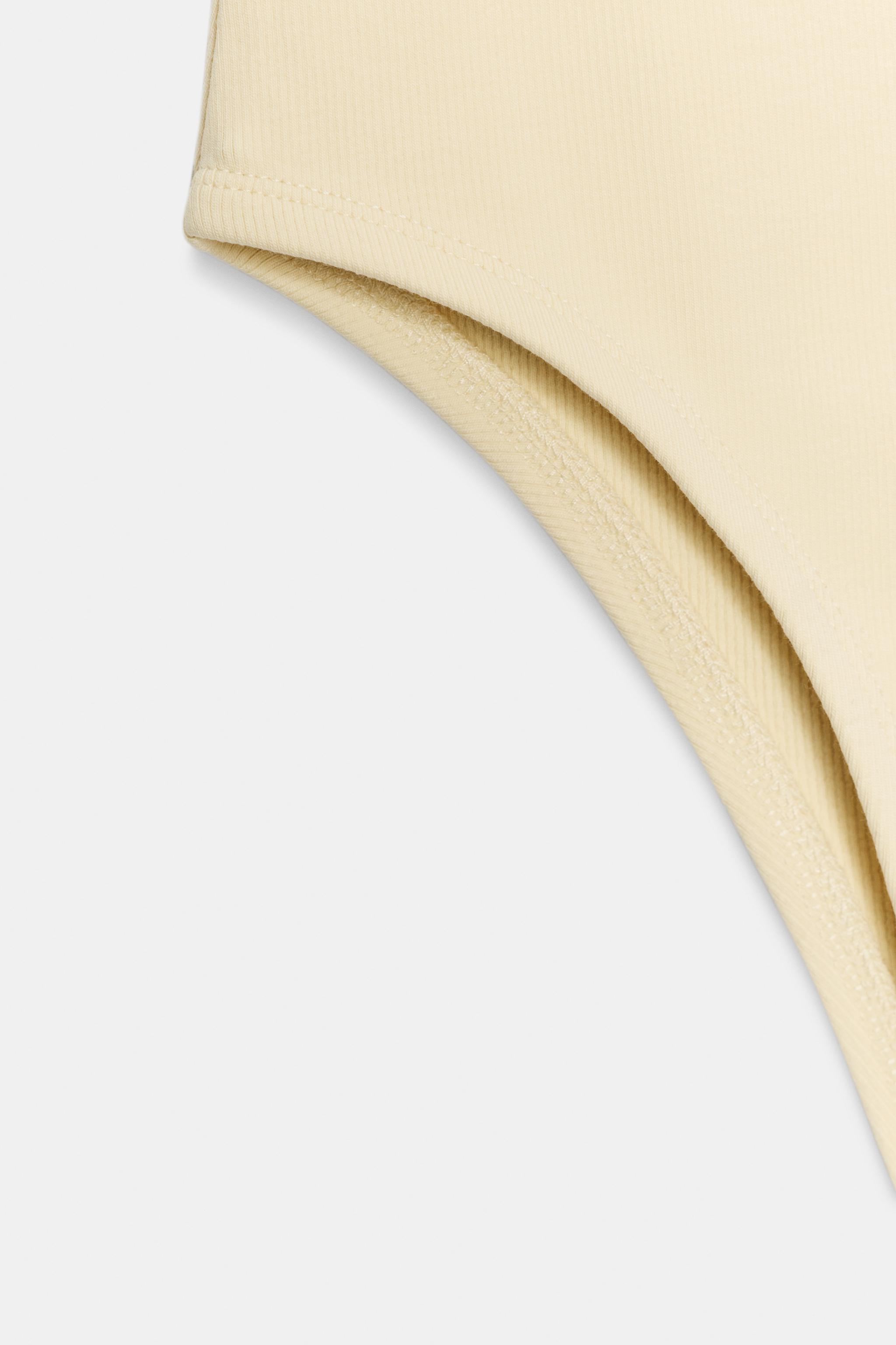 CONTRAST TRIM BODYSUIT